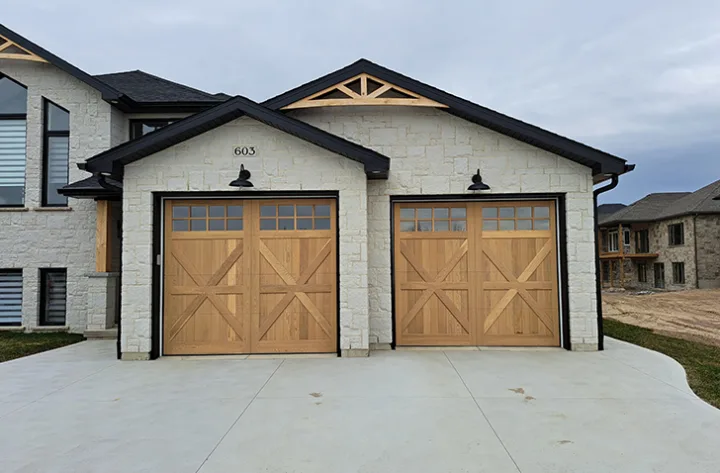 Revival Wood garage door shown on a home