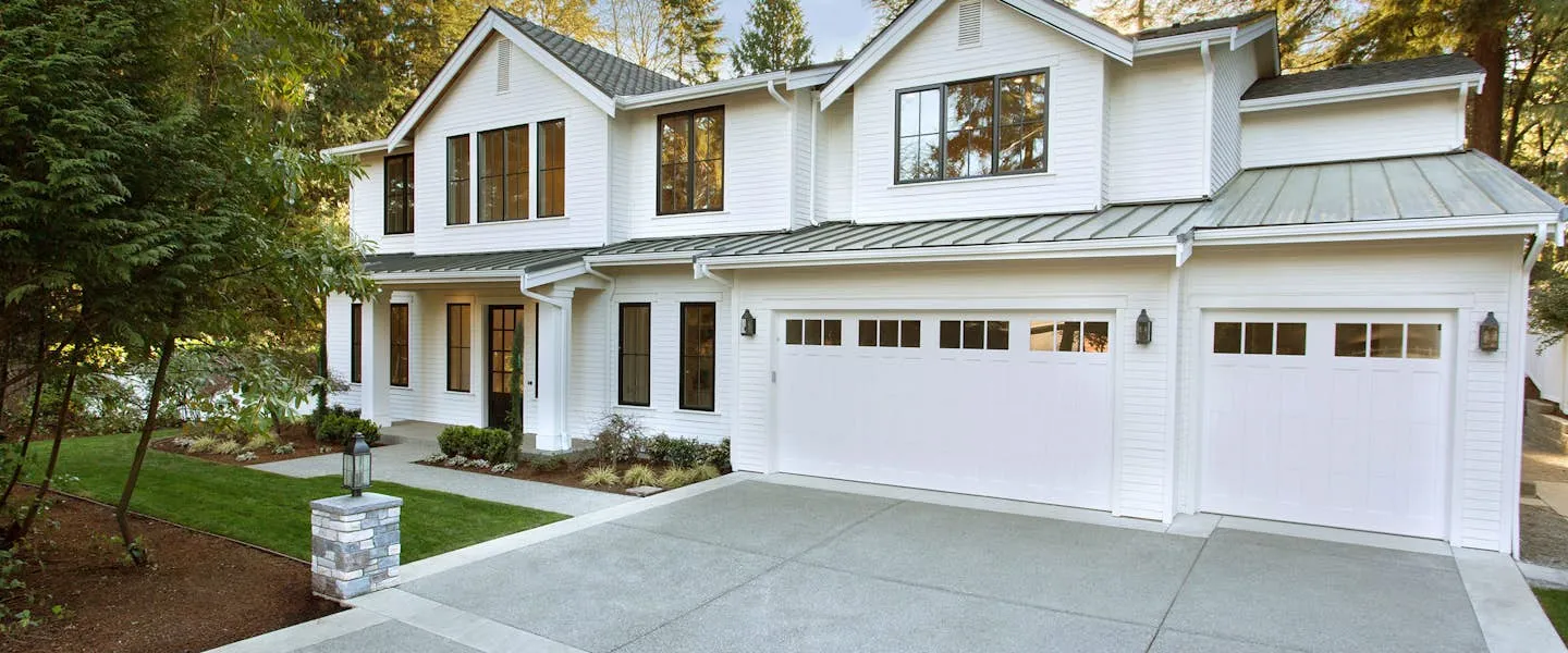 Clima Elite 5800 garage door shown on a home