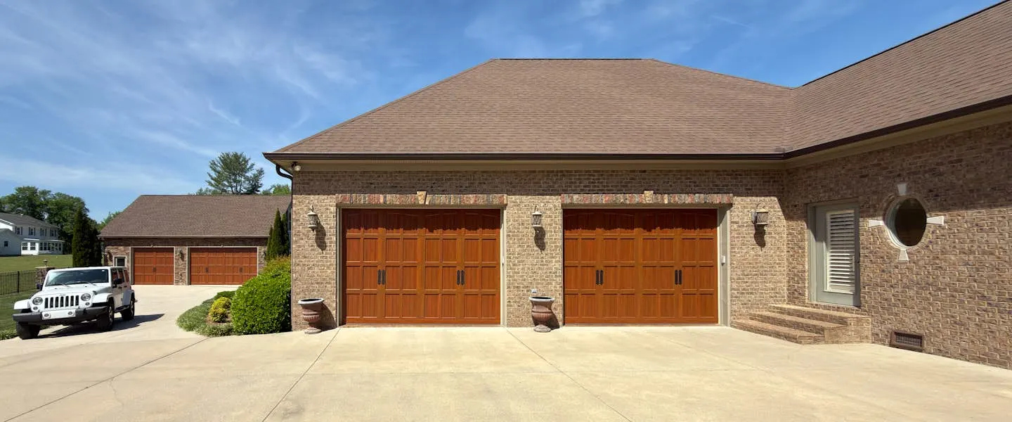 Infinity Classic 7800 garage door shown on a home