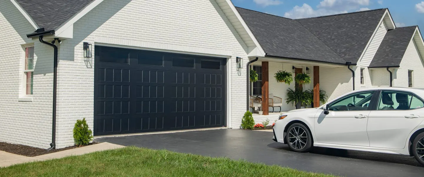 Therma Tech 3400 garage door shown on a home