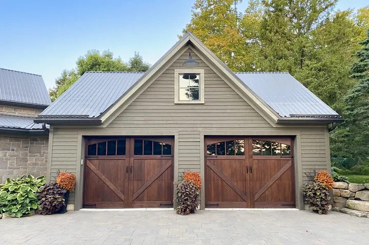 Revival Wood garage door shown on a home