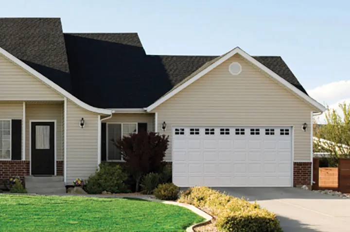 TradeMark garage door shown on a home