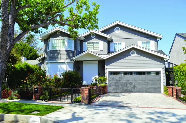 Encore garage door shown on a home