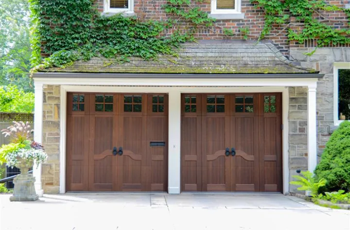 Revival Wood garage door shown on a home